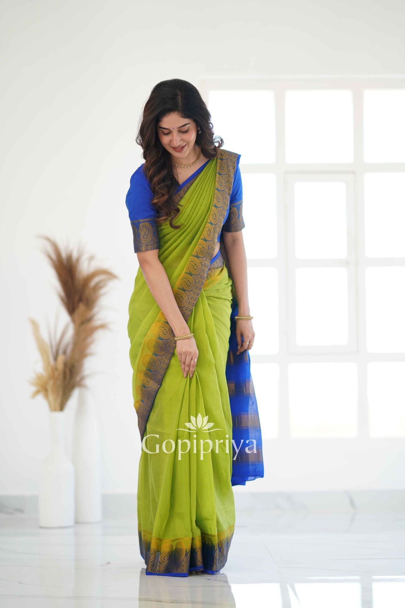 Pista Nd Blue Soft Semi Silk Saree With Golden Zari Border